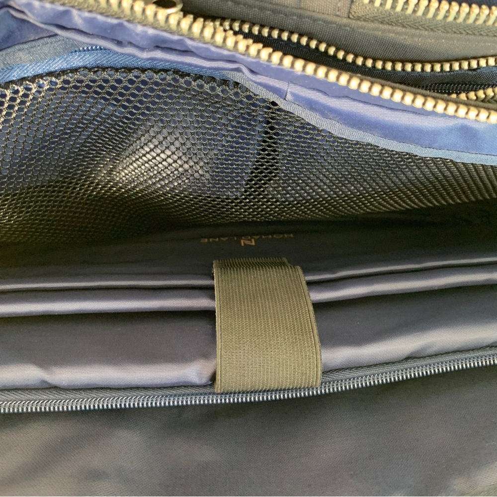 Black Travel Bag with Structured Design and Metal Feet - Picture 5 of 16